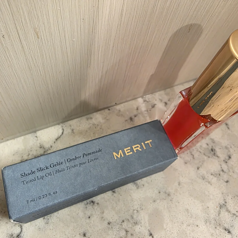 Merit Shade Slick Gelée Tinted Lip Oil in the shade 